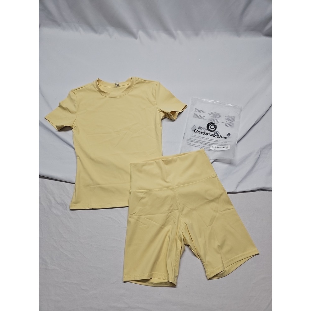 Uncia Active Yellow 2 Piece Short Sleeve Biker Shorts Set Womens Size Small NEW